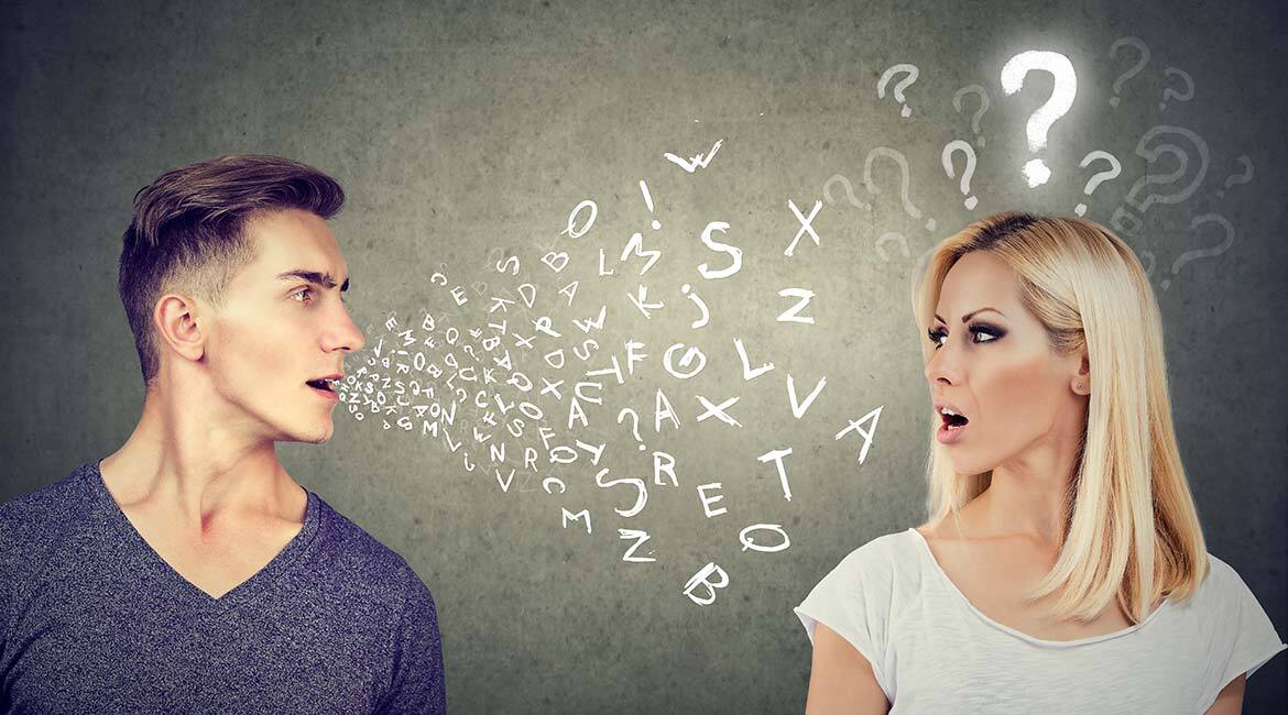 Man speaking letters while woman listens, puzzled by a floating question mark.