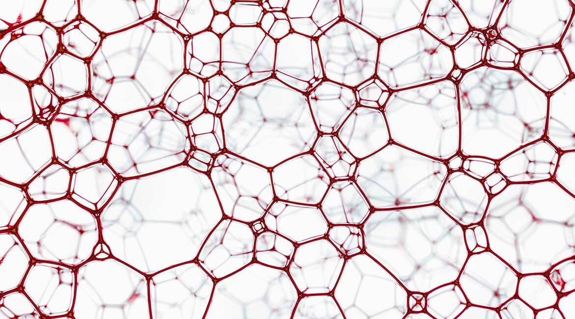 Abstract red network structure on white background, reminiscent of scientific or technological concepts.