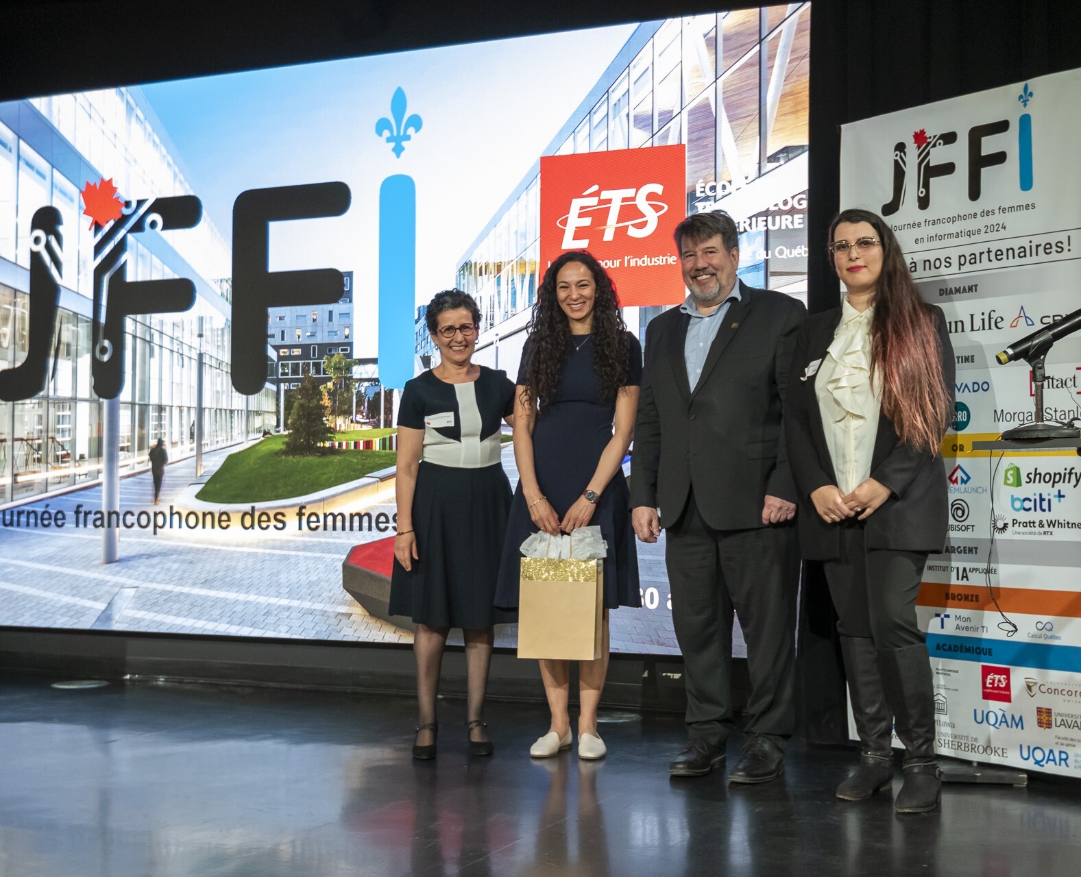 Événement à l'ÉTS célébrant la francophonie avec partenaires et invités.
