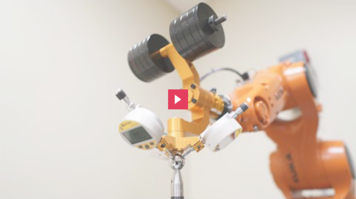 "Robotic arm performing a weightlifting exercise, showcasing engineering advancements."