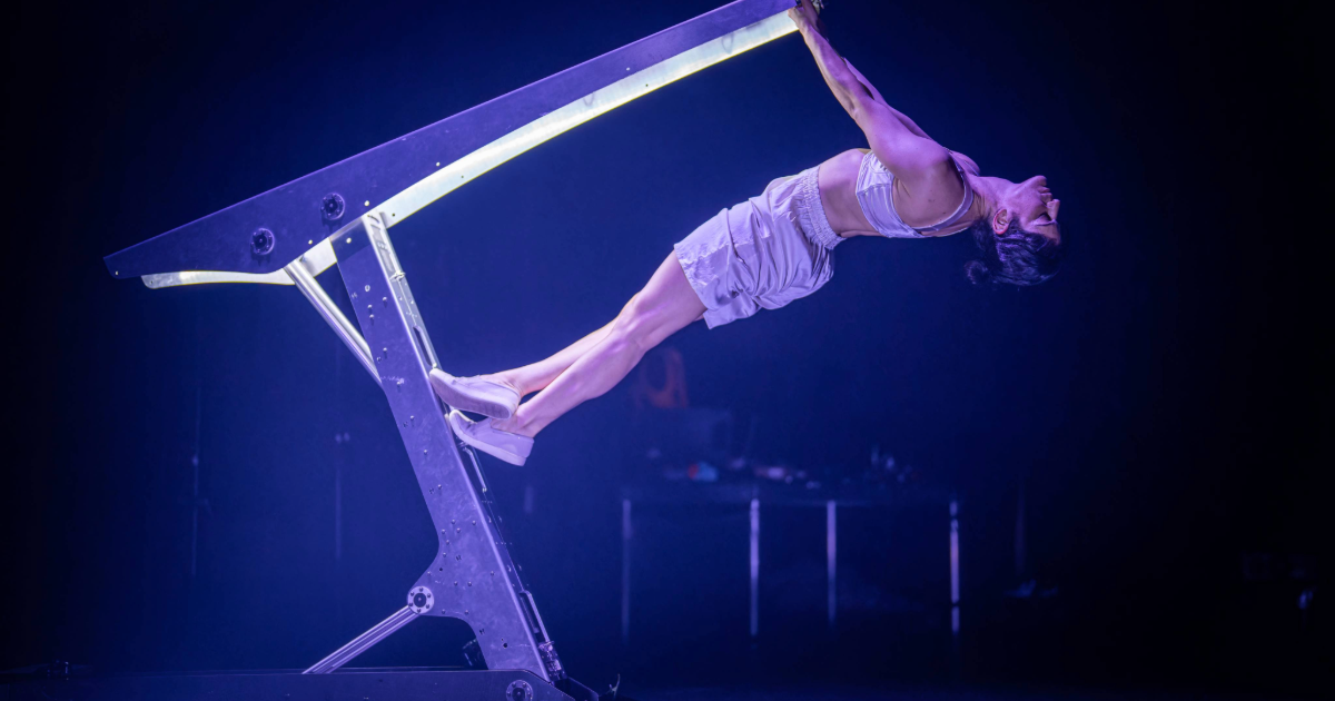 "Performance merging art and technology showcases human-machine interaction."