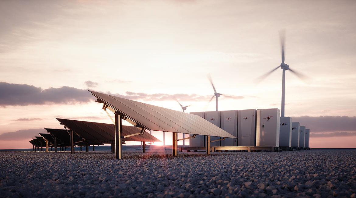 Renewable energy focus: solar panels and wind turbines at dusk.